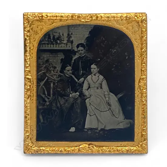 Gilt framed ambrotype - two women seated on a rustic bench - one standing,